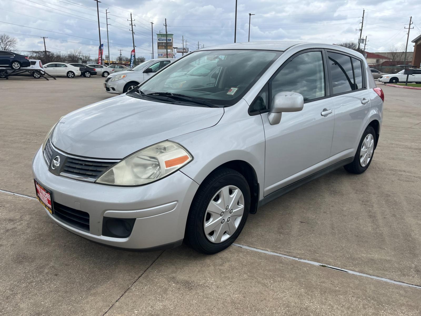 2009 SILVER /black Nissan Versa 1.8 S Hatchback (3N1BC13E09L) with an 1.8L L4 DOHC 16V engine, Manual transmission, located at 14700 Tomball Parkway 249, Houston, TX, 77086, (281) 444-2200, 29.928619, -95.504074 - Photo #2